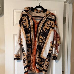 Elegant Long Sleeve Dress with Black and Orange Pattern